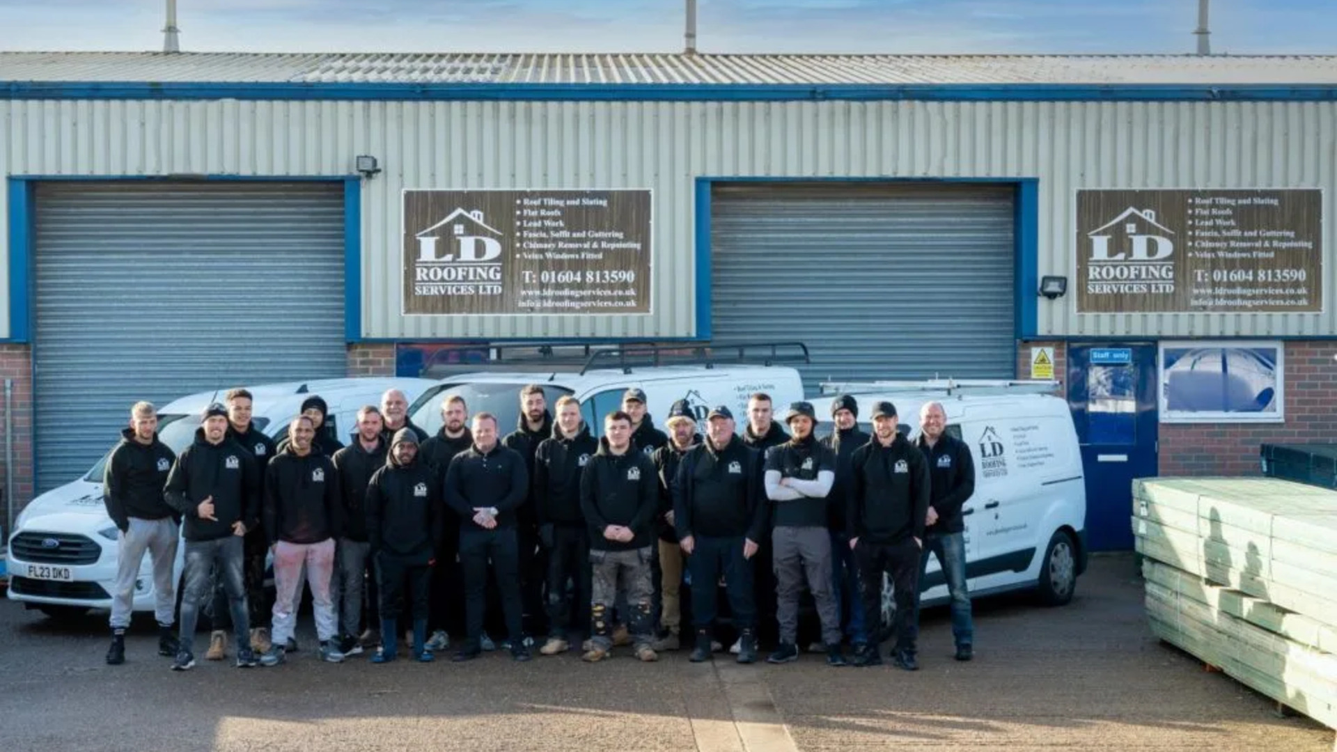 Professional UK roofing team working together