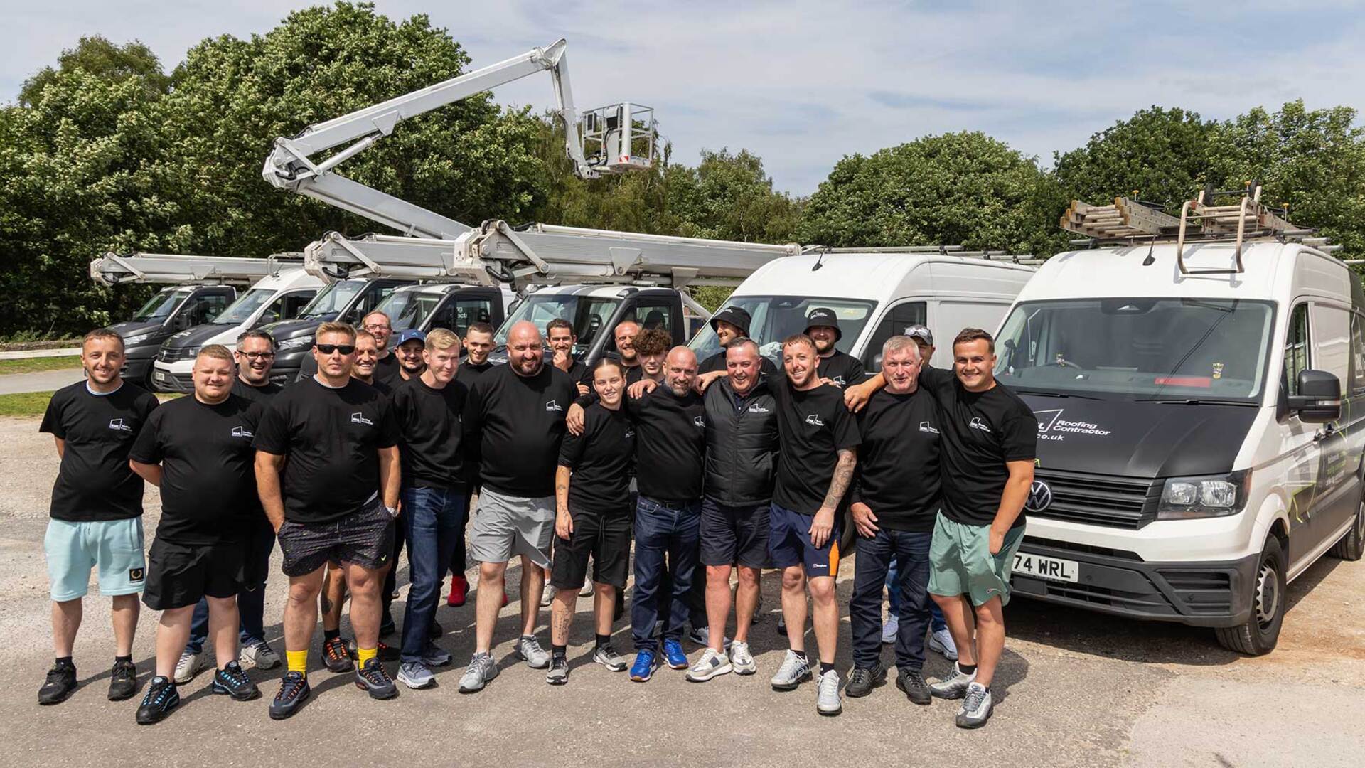 UK roofing team with van at job site